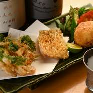 焼物とお造りなど、コース内のほかのお料理のバランスで決定されるという一品。食材そのものの旨みを堪能できる一皿です。
（10,000円～のコースの一品）