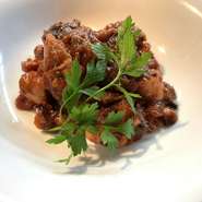 トマトにおぼれたタコ