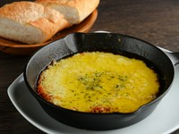 コーンのアヒージョチーズのせ