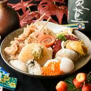 甘めの醤油を使った『金沢おでん』が名物です。とろろ昆布がのった大根や白こんにゃくなどの定番をはじめ、バイ貝や赤巻貝などの貝類、湯葉巻き真丈雲丹のせなどの創作おでんも豊富です。