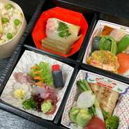 お造り付きの豪華なお弁当です。出汁の優しい味付けで日本料理屋ならではの繊細なお弁当に仕上げています