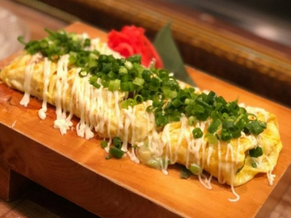 大人気！鉄板たまご料理『じっくり煮込んだ豚角煮入りとんぺい焼き』