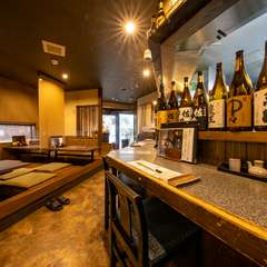 新鮮な魚料理と日本酒を片手に、自分の時間をゆったりと楽しんで
