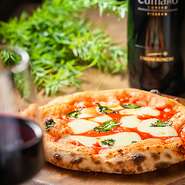 Pizza Margherita.Hozzarella cheese,Basil and Tomato Sauce.