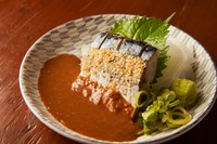 カンパチに胡麻を絡めた博多名物料理