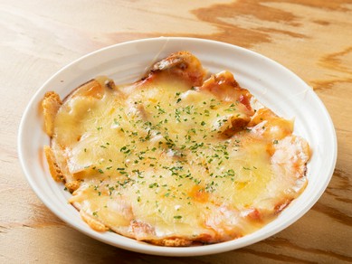 鉄板で焼くオリジナル『鉄板ピザ』