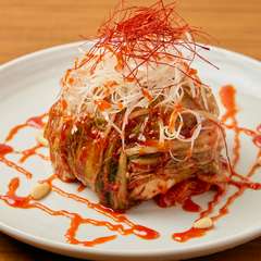 一口ごとに異なる味わいを楽しめる『魚介とフルーツのキムチポッサム』