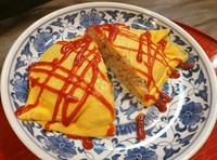 食が進む味わい。ガーリックバターライスを包んだ『白オムライス』
