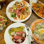 ピッツァはナポリピッツァ専門石窯で焼き、「なにわ黒牛」は低温調理で仕上げています。前菜、カルパッチョなどは中央市場で仕入れる鮮魚を使用。パスタのベースは、ミシュラン直伝の味でつくられます。