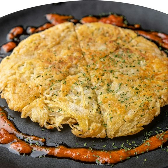 こんがり焼き上げたじゃが芋と香ばしいチーズの香ばしさが抜群『パリッとじゃが芋のチーズ焼き』
