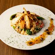 ズワイガニと浅利の旨味を活かしたリゾット