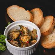 つぶ貝の自家製香草バター焼き