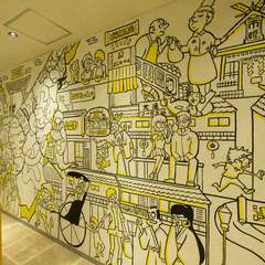 金沢や能登を表現した、ポップなイラストで埋め尽くされた店内