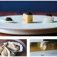 牡蠣2個＋3種類のキャビア＋シャンパン　
牡蠣と「キャビアスプーン」、「キャビアクレープ」、「イカとキャビア」の3種のキャビアプレートのセットメニューに、シャンパンをセットした当店人気のメニューです。