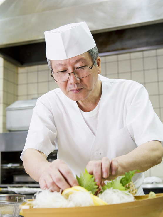 宮城　良勝 氏
