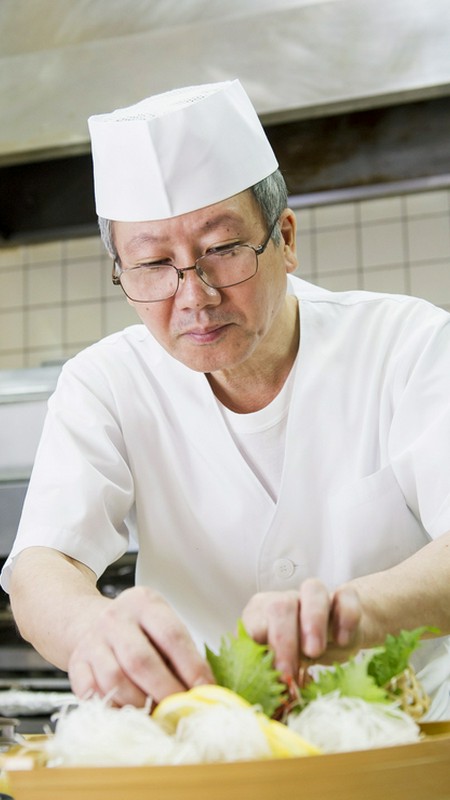 宮城　良勝 氏