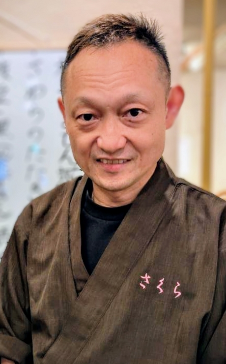 飯田　健二 氏