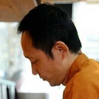 飯田　健二 氏