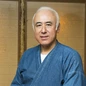 飯山　賢治