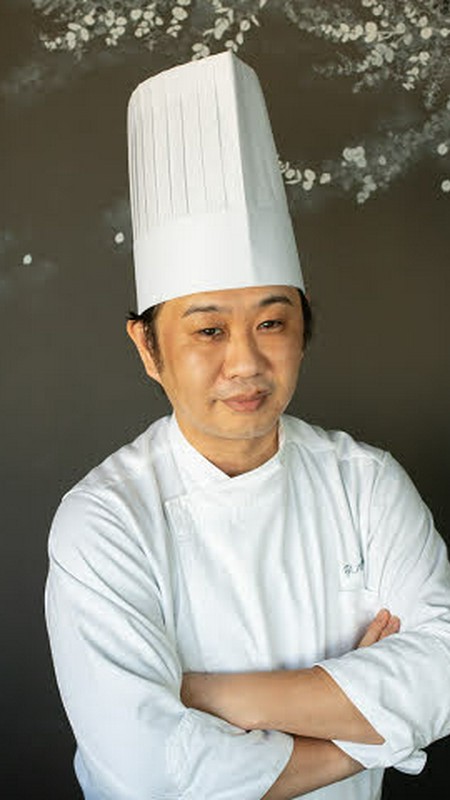秋岡 良忠 氏