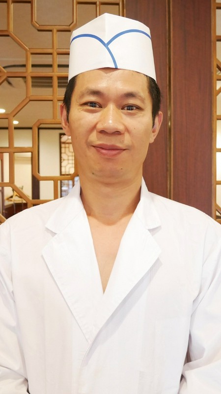 楊　明国 氏