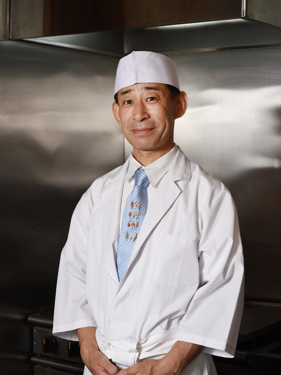 平尾　久司 氏