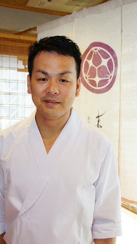 西浦　禎祥 氏