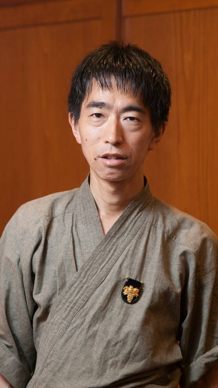 長島　照賢 氏