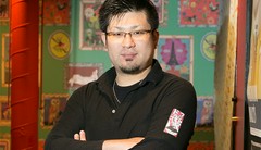 新名 祐憲 氏