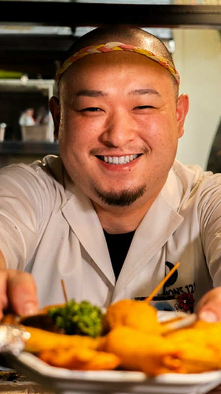 江崎　大晃 氏
