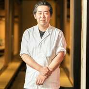 藤井　謙治 氏