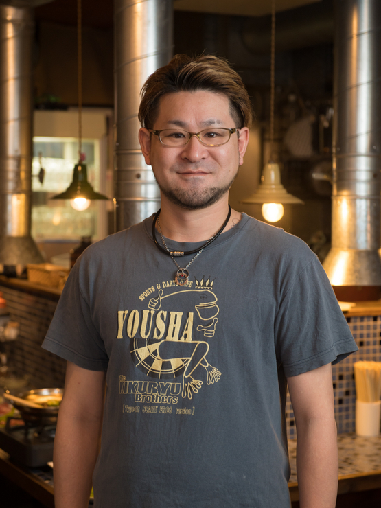 磯　修一 氏