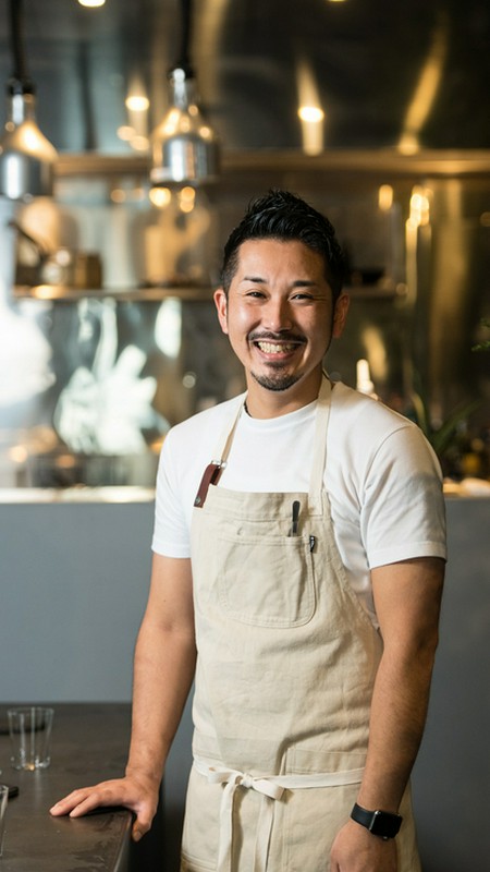 高津　健一 氏