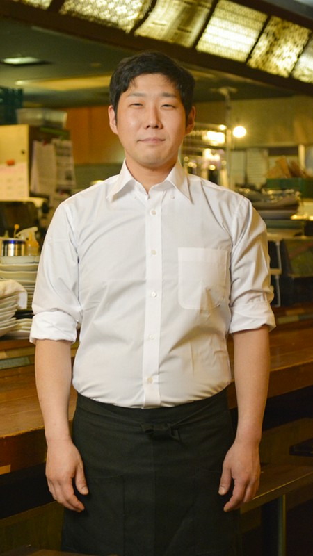 萩原　賢児 氏