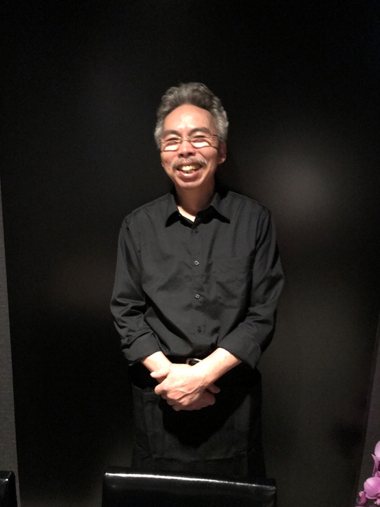 塩塚　善美 氏