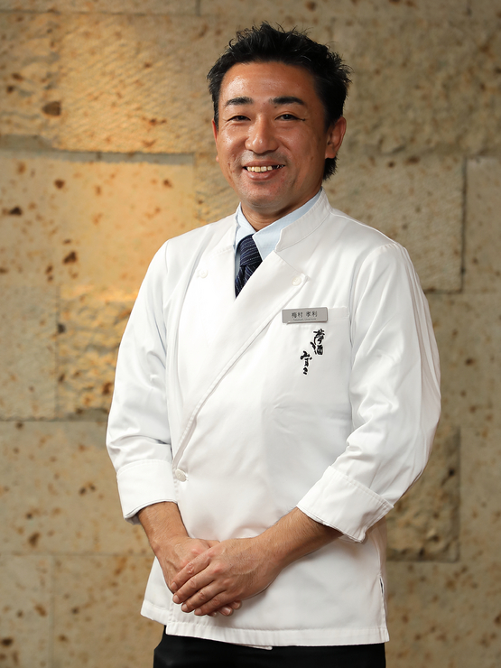 梅村　孝利 氏