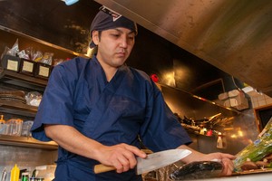 土佐　九右衛門 氏