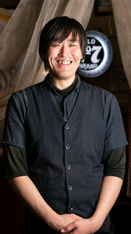 西出　洋次 氏