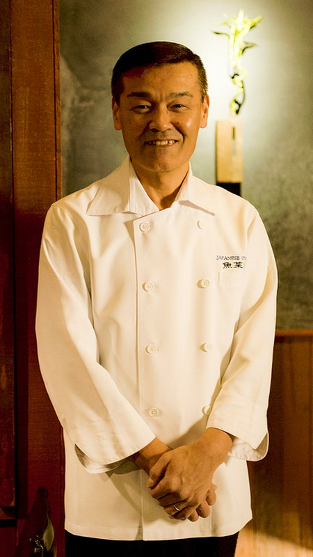 片本　功 氏