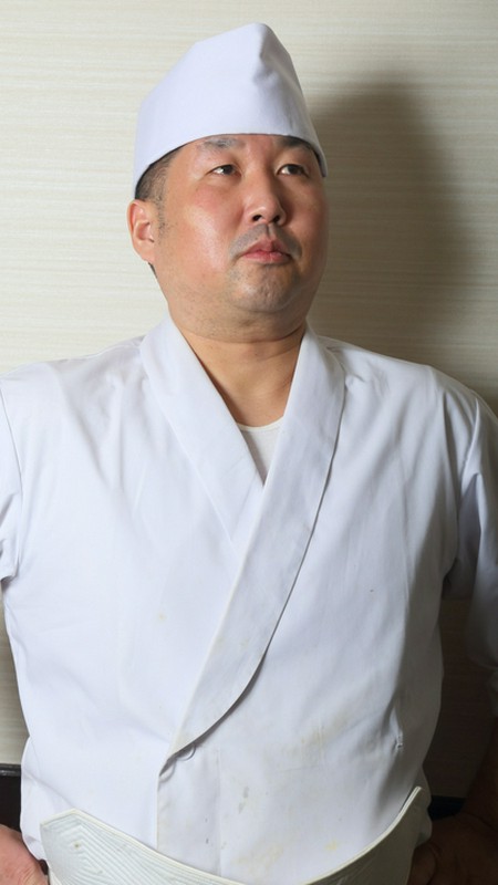 冨谷　誠 氏