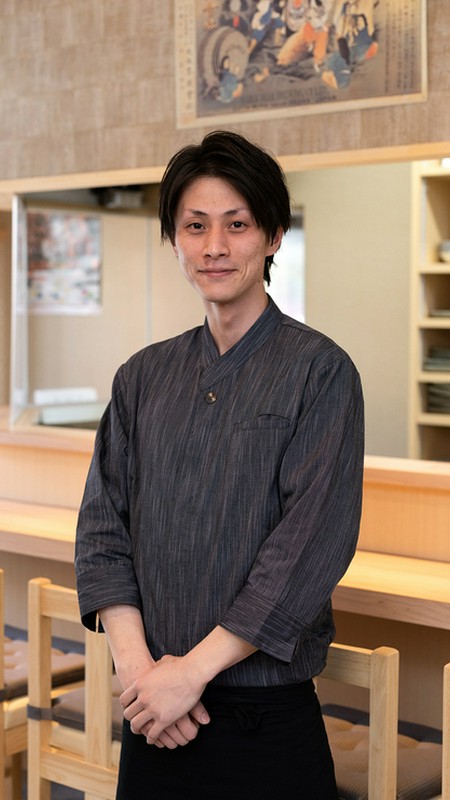 稲冨 氏