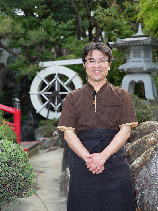 飯田　貞広 氏