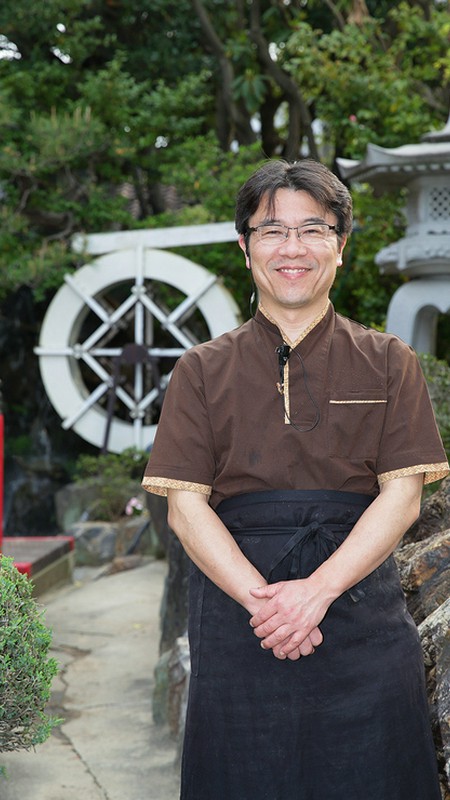 飯田　貞広 氏