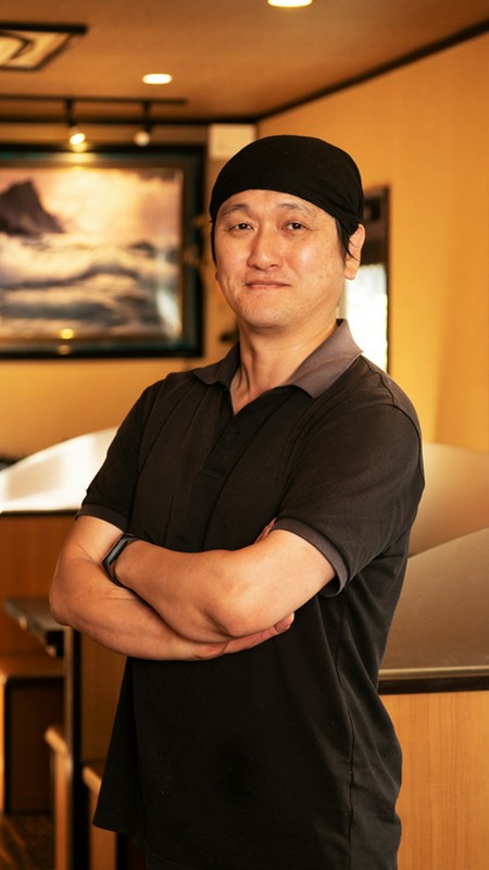 倉本　善甲 氏