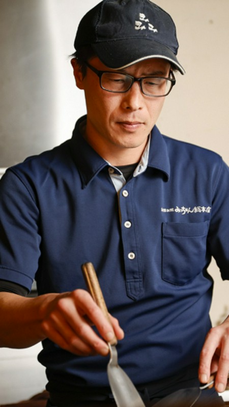 長清　考伸 氏