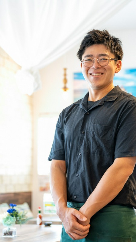 信廣　祥希 氏