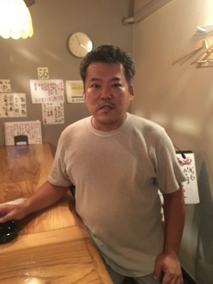 吉賀　拓麿 氏