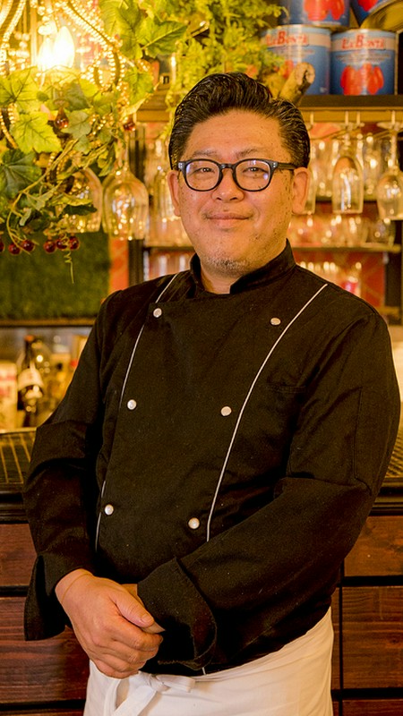 東　栄一 氏