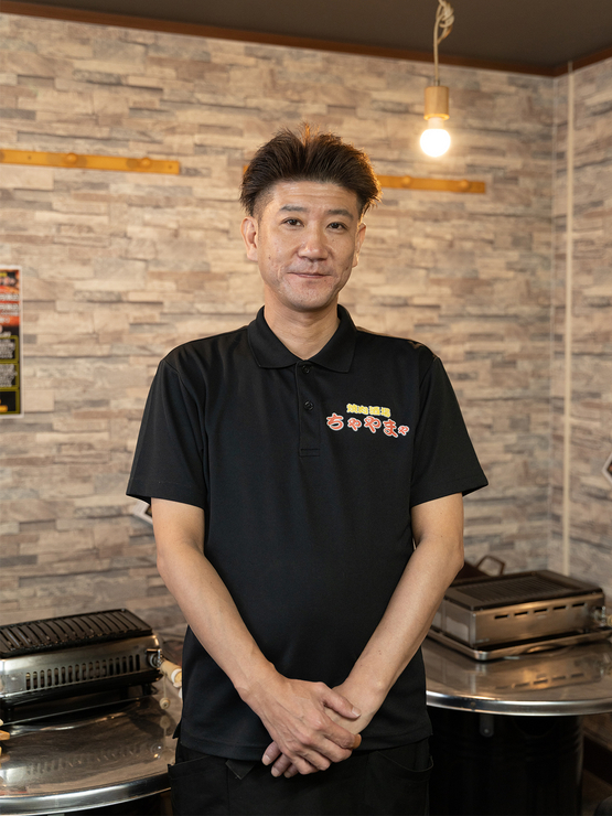 濱崎　元重 氏