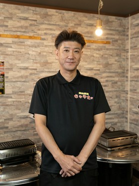 濱崎　元重 氏